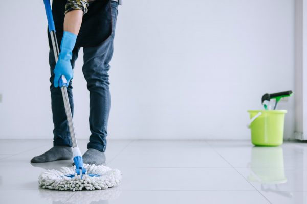 Husband housekeeping and cleaning concept